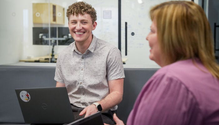 Employees smiling
