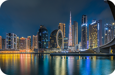 Dubai highrise builder at night.