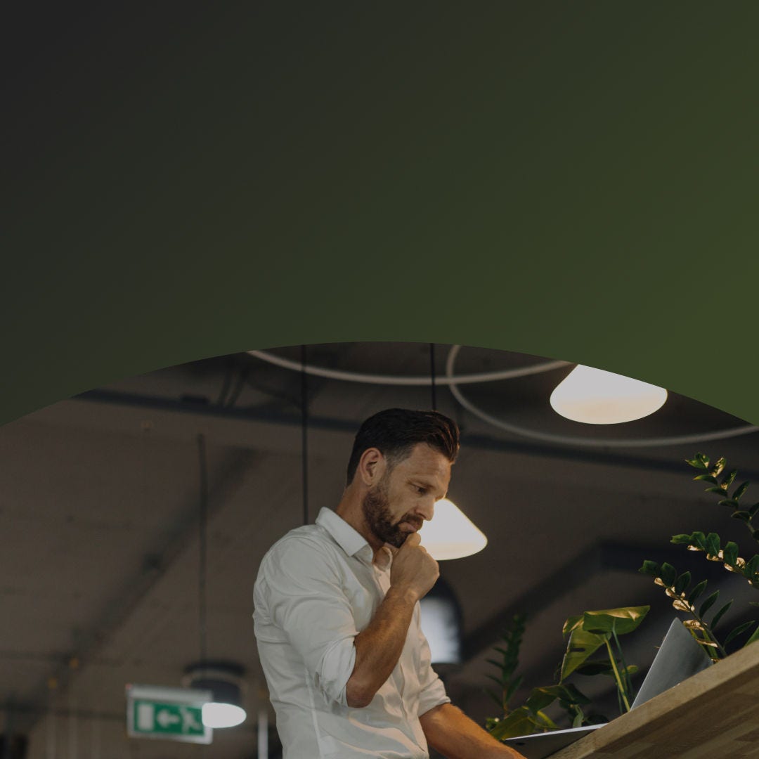 People at their desks with computers