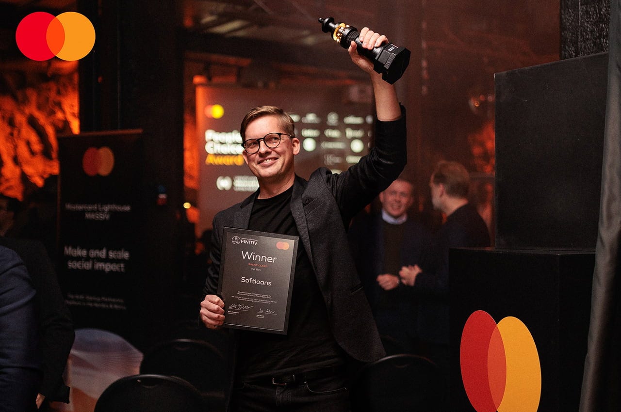 softloans winner excited with trophy
