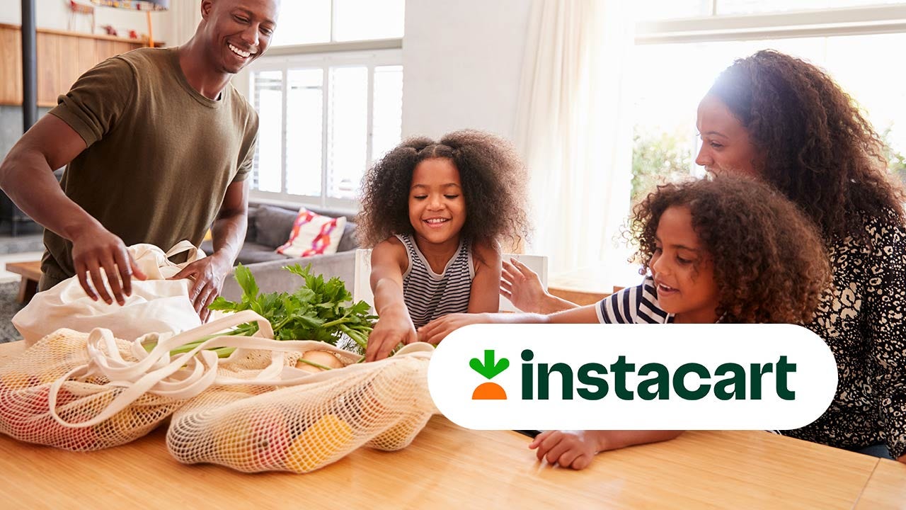 Family unpacking groceries. Instacart logo.