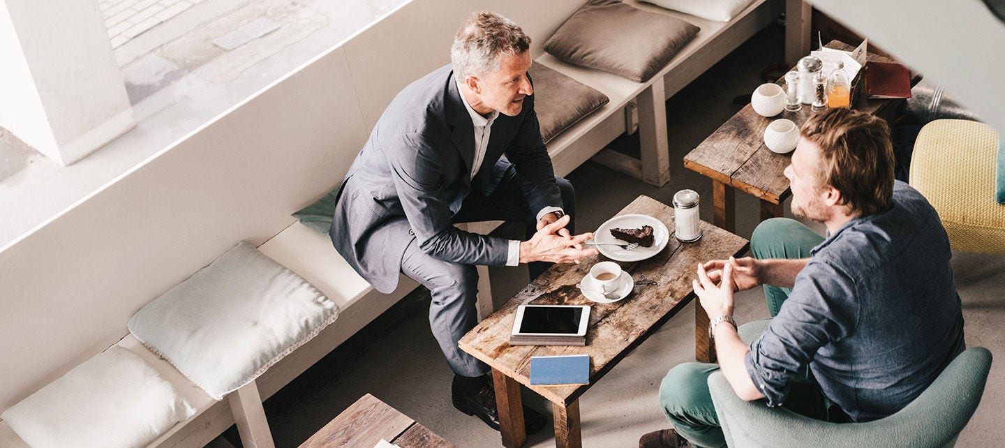 Men having a meeting over lunch