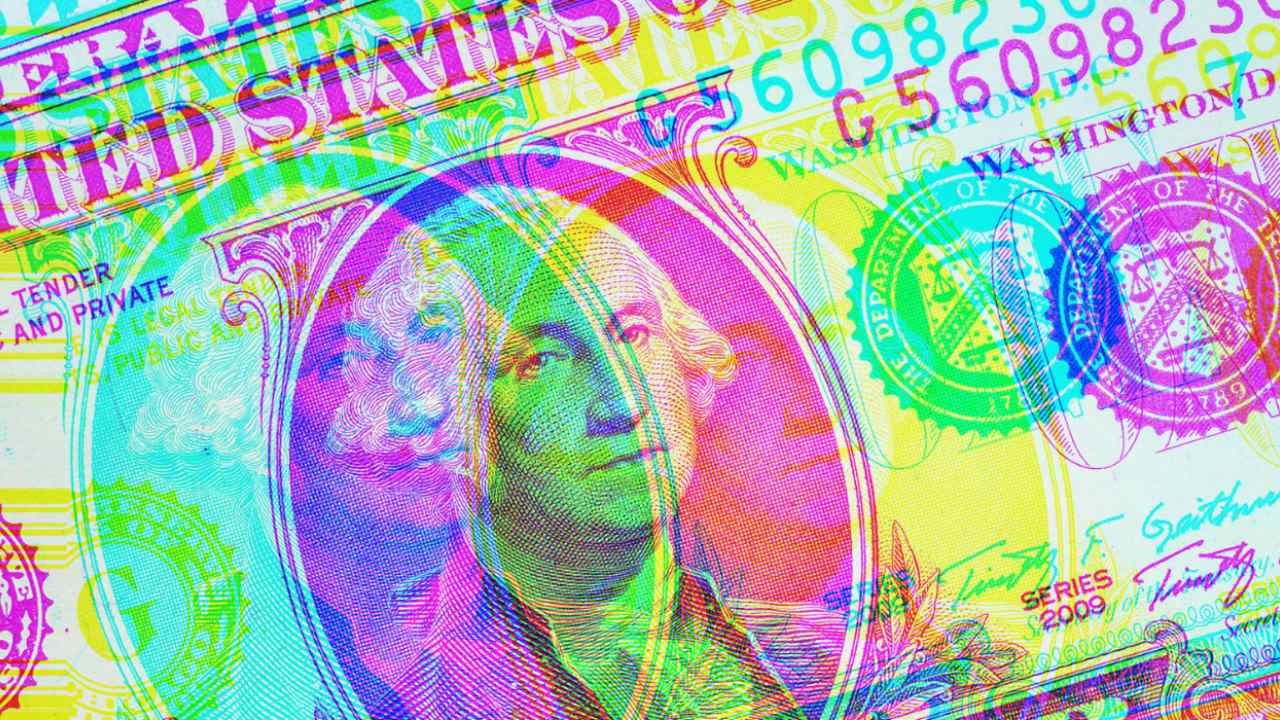 Un billete de dólar con un filtro multicolor