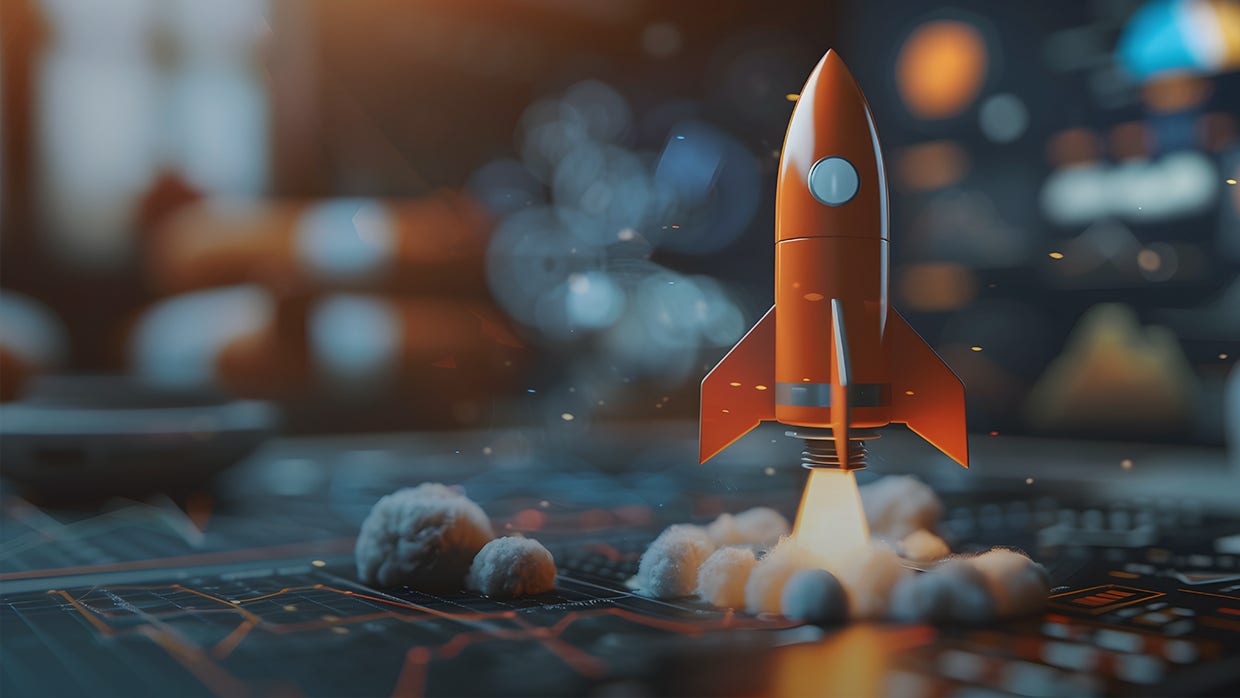 Une fusée rouge lancée depuis une plateforme numérique avec de la fumée et un arrière-plan flou sur le thème de la technologie. Le texte indique : « Lancement . Favorisez l'engagement des consommateurs, optimisez les transactions et analyser les tendances. »