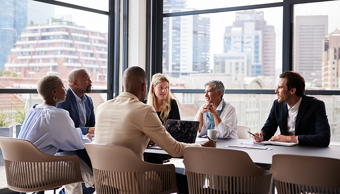 Group of senior leaders having a business meeting
