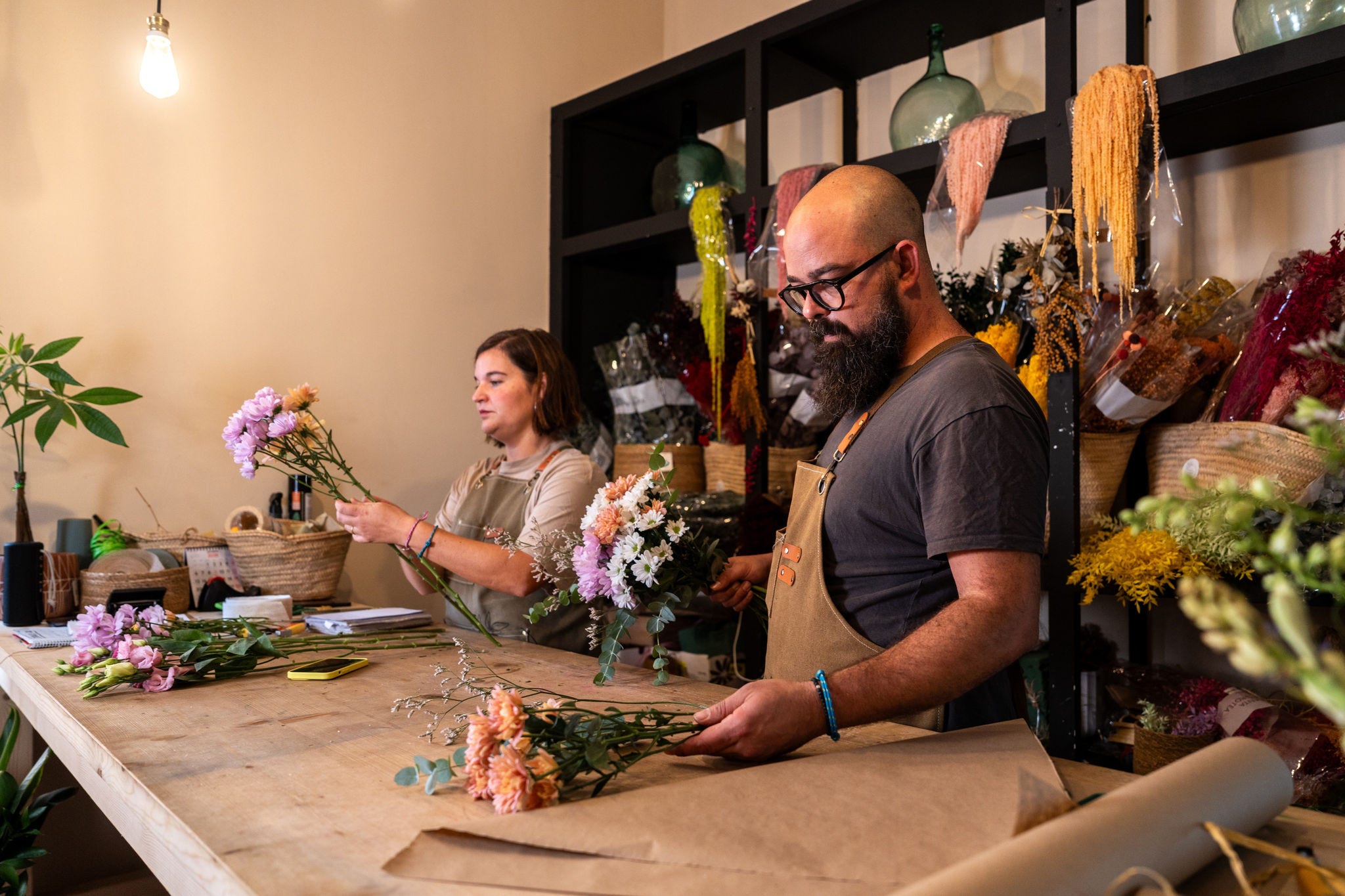 two people working in flower shop