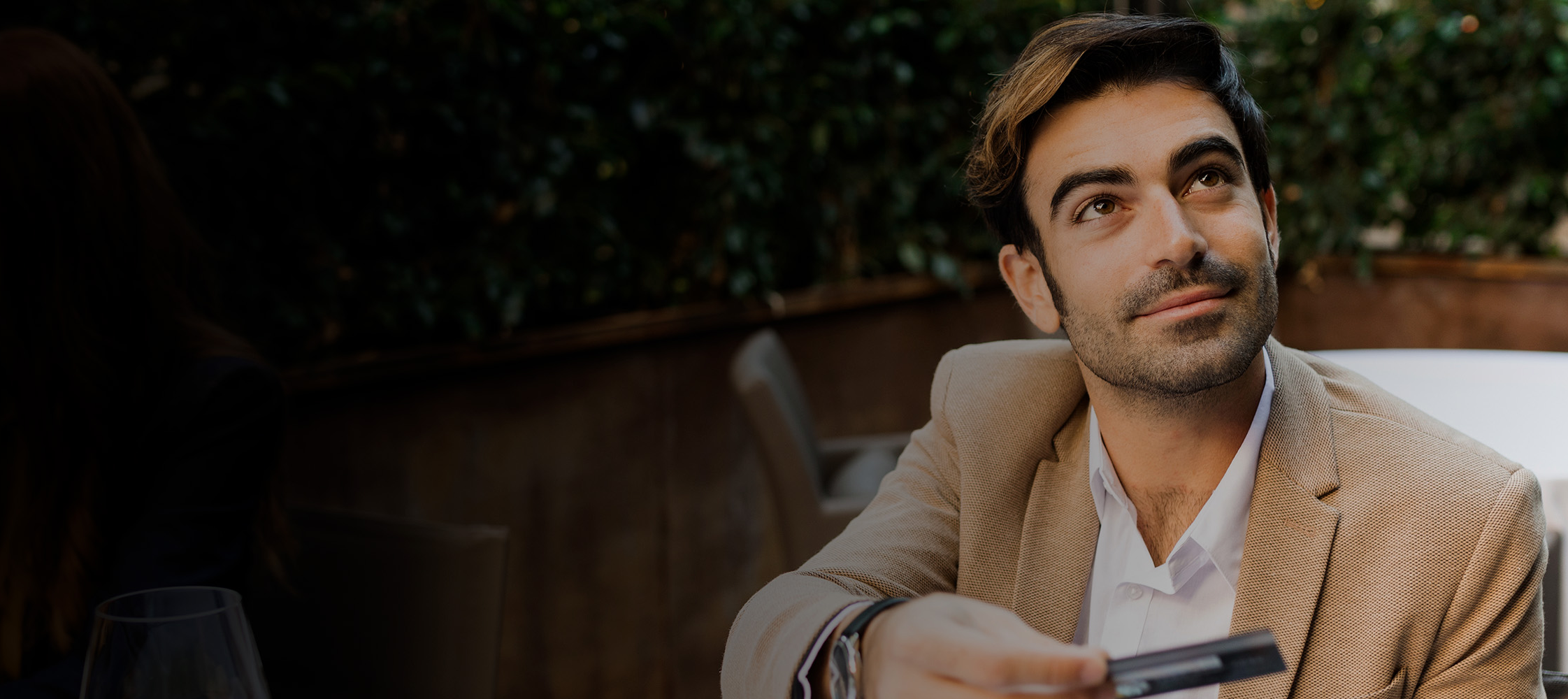 Man paying via mobile at a restaurant