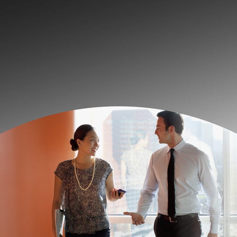 two office workers talking
