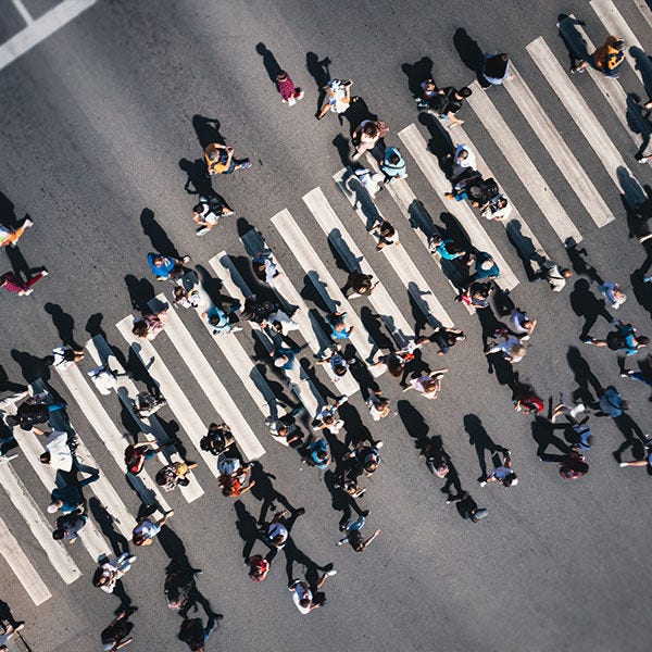 Group of people crossing the street