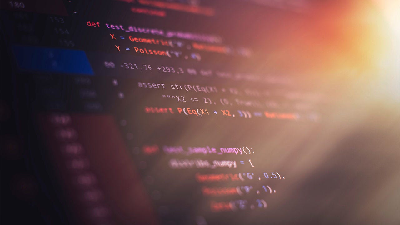 Mobile application design concept shown as computer code.