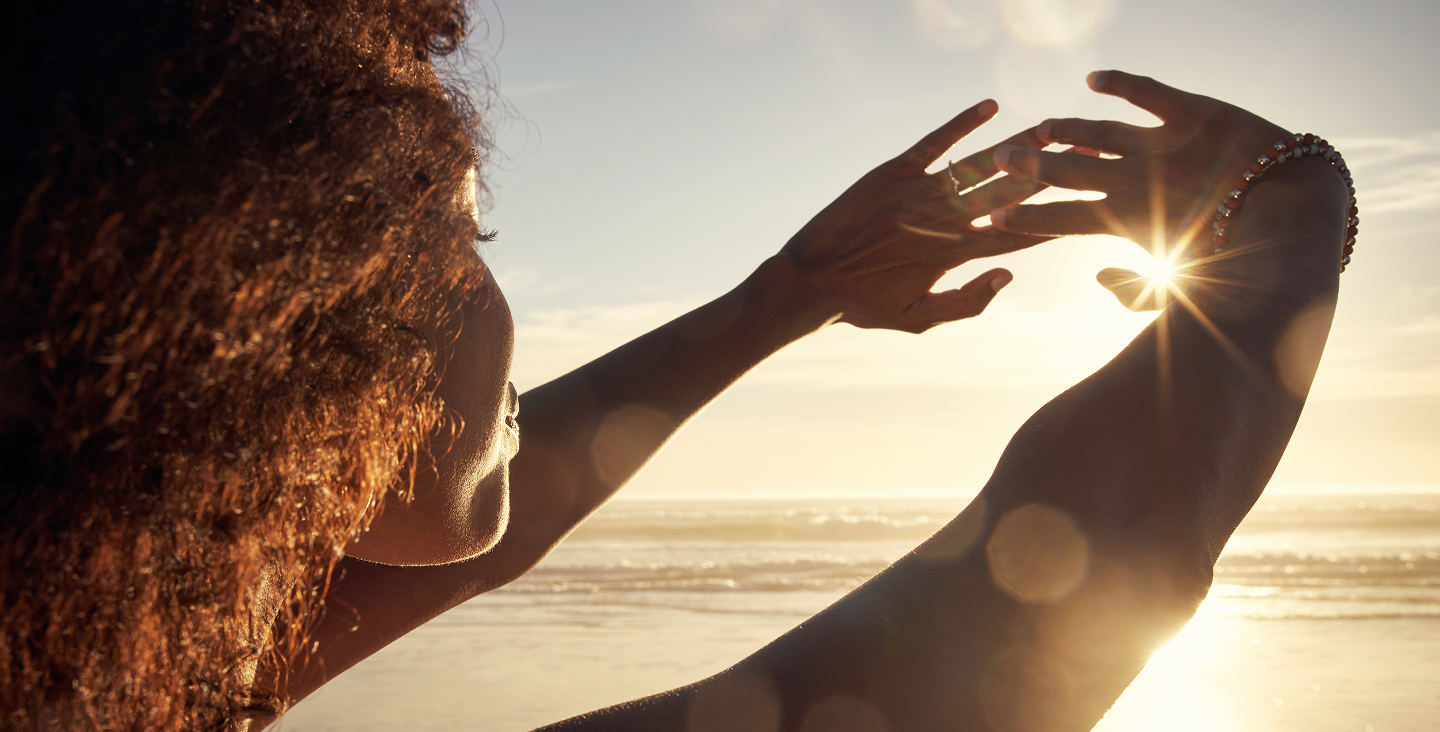 Woman looking at the sunset