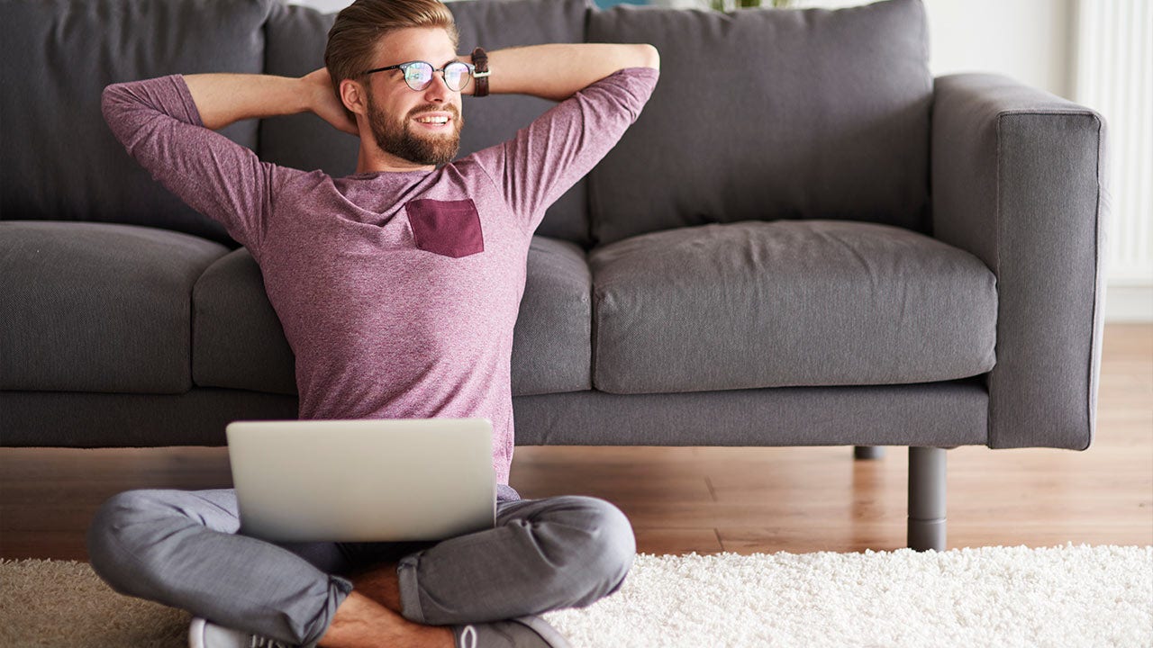 Man with good vibes sitting on the floor.