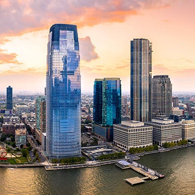 Skyscraper buildings with sunset.