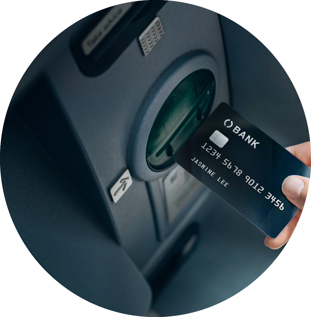 hand placing card in atm